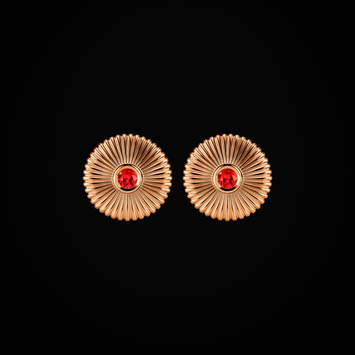 Arete flor fabergé circular troquelada rubís centrales oro rosa 18k