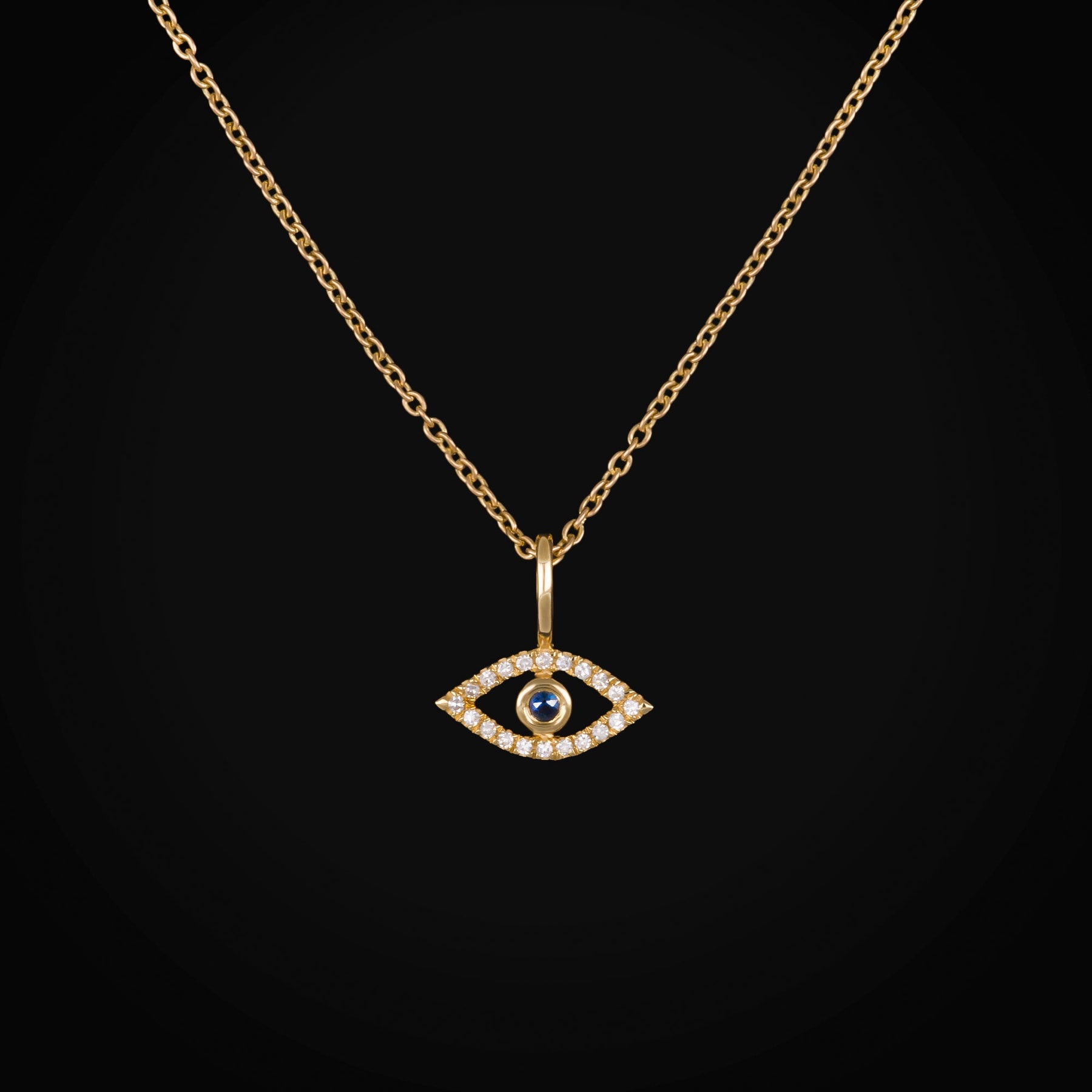 Cadena con Dije Ojo Turco 1 Zafiro Azul Central y Diamantes Oro Amarillo 14K + Estuche