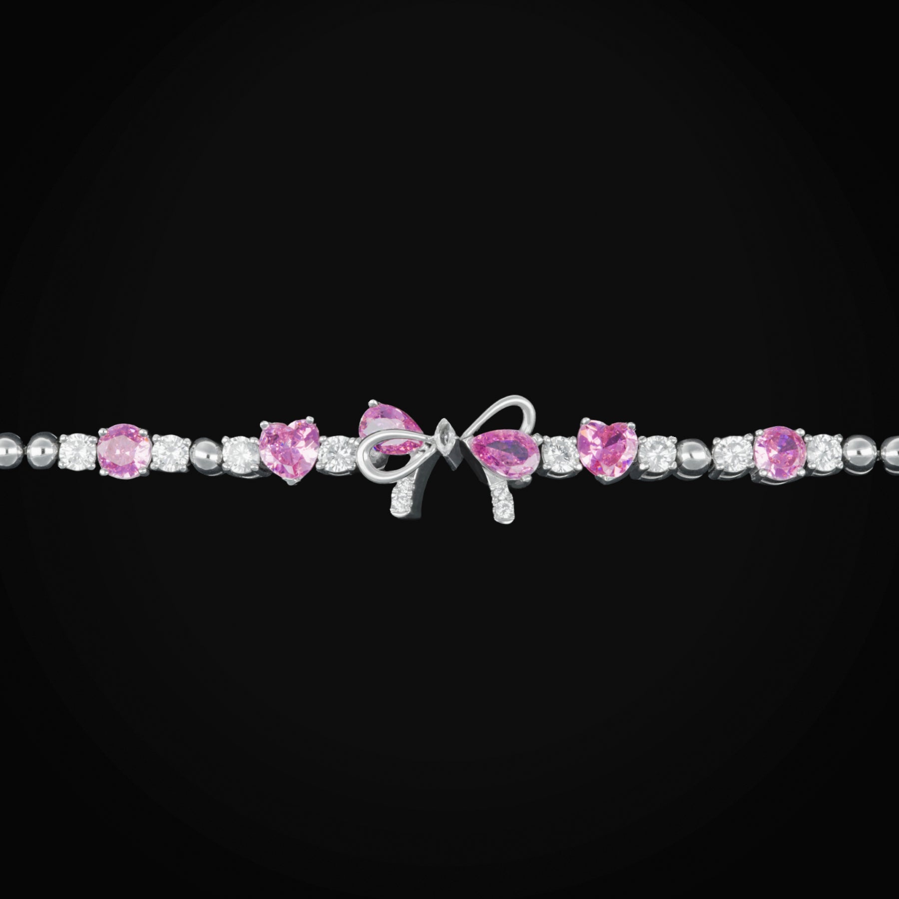 Pulso con Moño Central Zirconia Blancas y Rosas de Oro Blanco 10K + Estuche