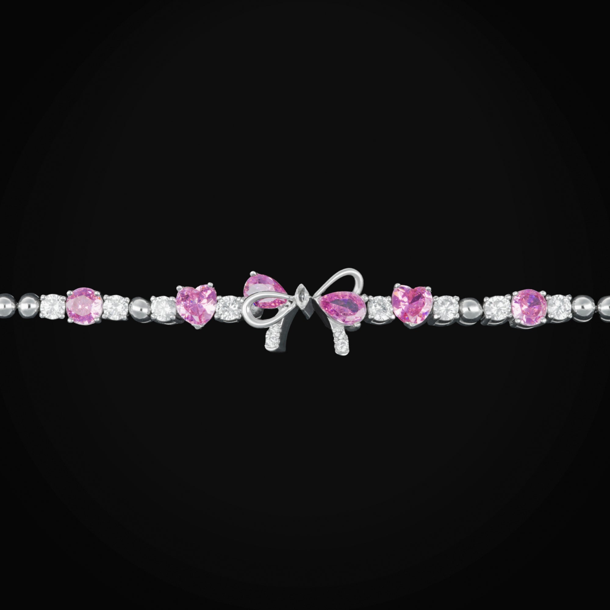 Pulso con Moño Central Zirconia Blancas y Rosas de Oro Blanco 10K + Estuche